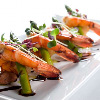 Caribbean prawns with crispy chorizo grilled asparagus