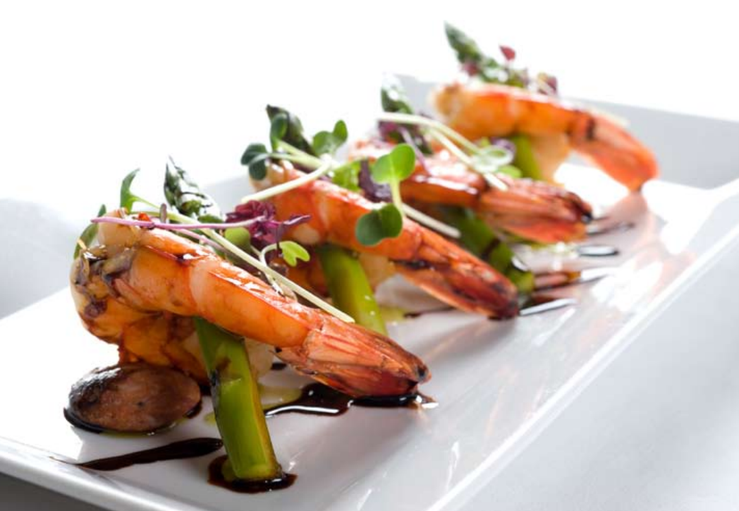 Caribbean prawns with crispy chorizo grilled asparagus