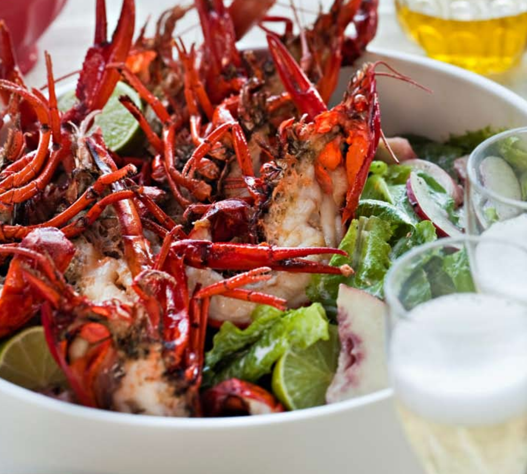 Garlic fried crayfish with peach and baby cos salad and buttermilk dressing
